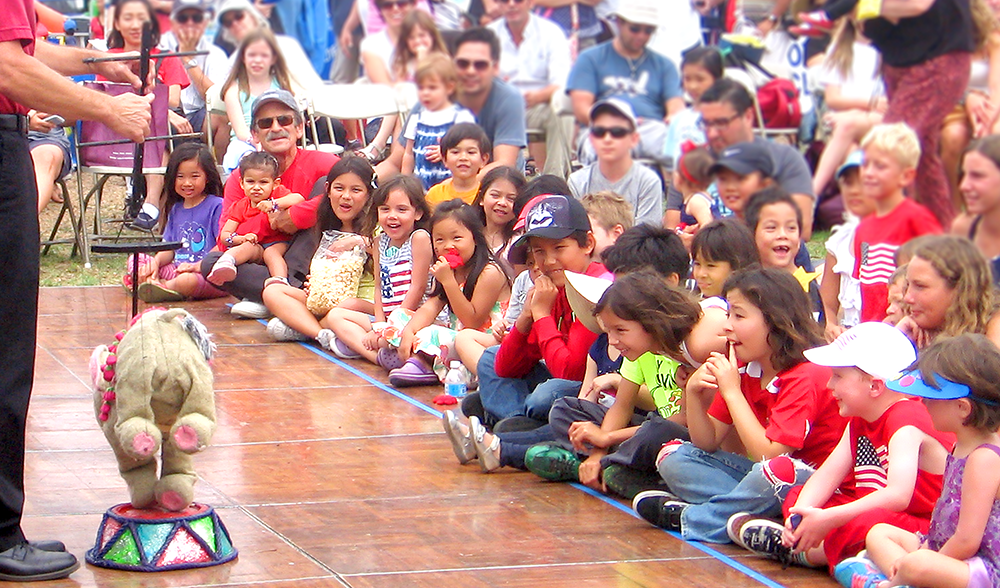 Children watch puppet show