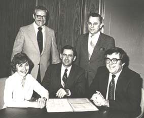 The first City Council seated left to right, Marilyn Ryan, Gunther Buerk, and Robert Ryan. Standing 