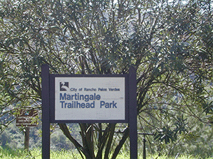 Pictures of Martingale Trailhead Park sign in front of trees and a narrow trail on a hill